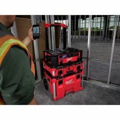 Deals ⭐ Milwaukee PACKOUT 20 in. 2-Wheel Utility Cart with M18 Lithium-Ion Cordless PACKOUT Radio/Speaker with Built-In Charger 💯 -Deals Tool Storage Store red black milwaukee modular tool storage systems 48 22 8415 2950 20 c3 1000
